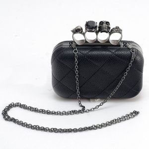 Black Knuckle Clutch with Skull Jeweled Detail